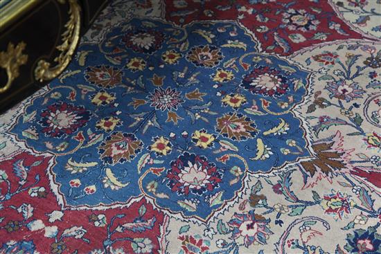 A Tabriz carpet, 13ft 2in by 9ft 4in.